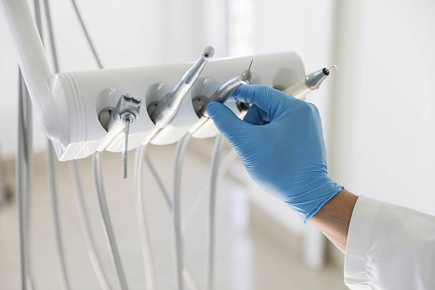 Professional Tooth Extraction technician working in Monmouth, IL